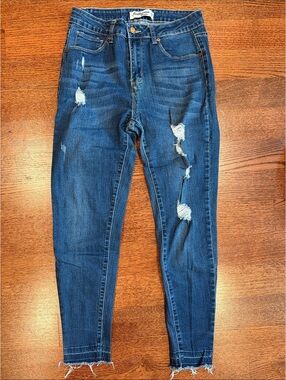 Distressed Blue Skinny Jeans with Raw Hem